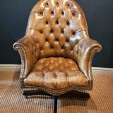 Antique Deep Buttoned Leather Revolving and Rocking Chair at Sturmans Antiques Furniture for sale 