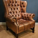 Antique 1920's Tan Hide Wing Back Arm Chair at Sturmans Antiques furniture for sale 