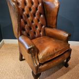 Antique 1930's Tan Leather Wing Back Arm Chair at Sturmans Antiques furniture for sale