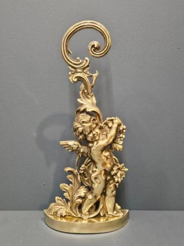 Antique Cherub Door Stop at Sturmans Antiques metalware for sale